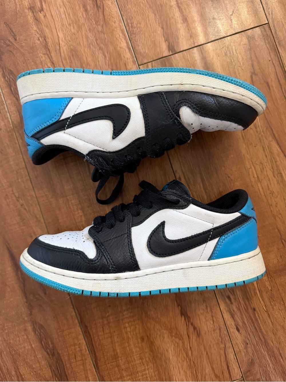 Nike Air Jordan 1 Low Top Sneakers in White, Black & Blue